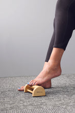 Load image into Gallery viewer, picture of a foot on a wooden foot massager