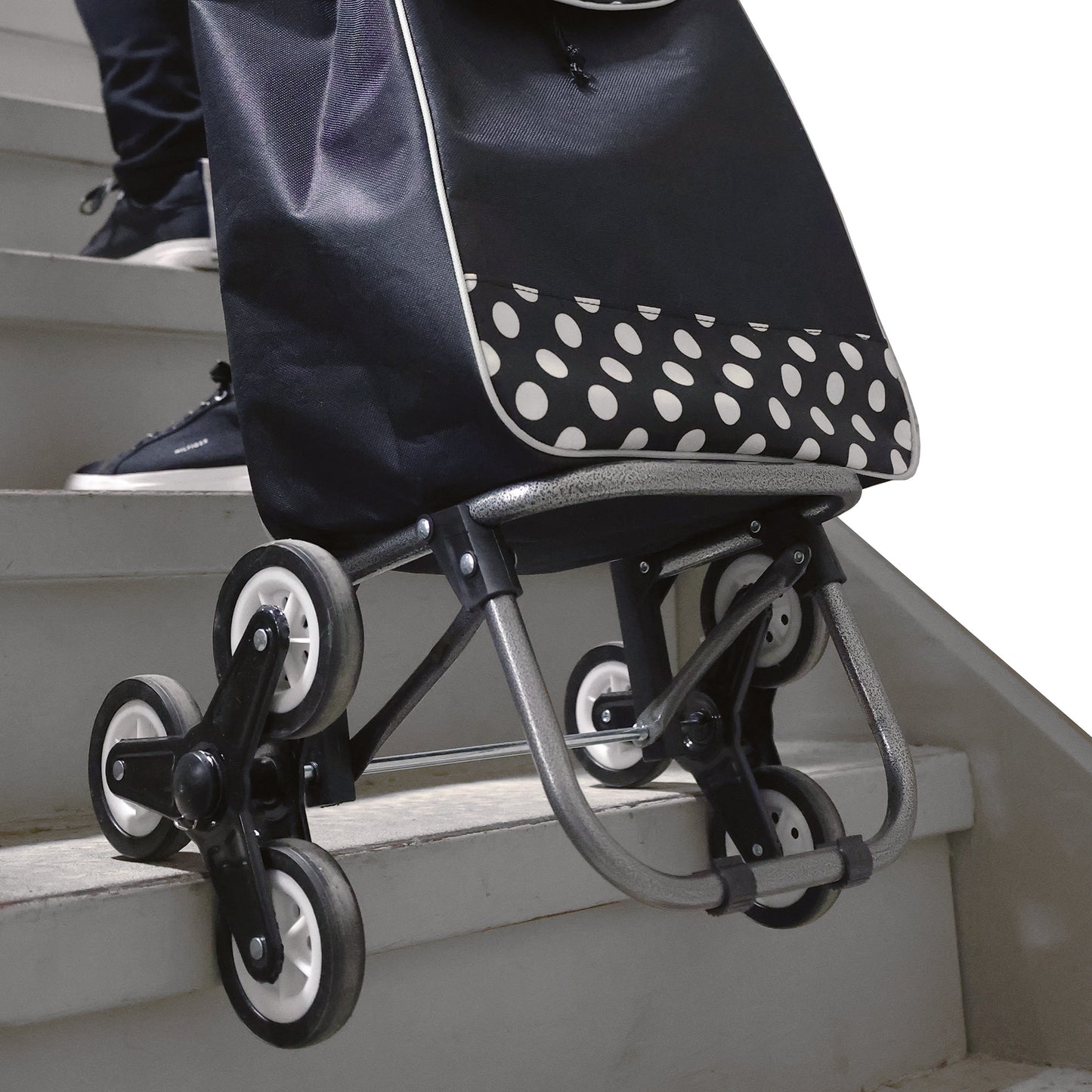 shopping cart being pulled up the stairs