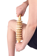Load image into Gallery viewer, massage roller pin used on a persons thigh
