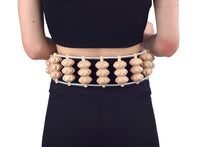 Load image into Gallery viewer, wooden rope massager being used on a lower back