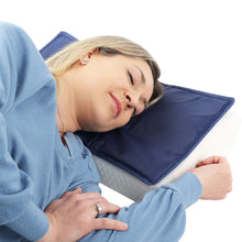 Load image into Gallery viewer, person sleeping on a cooling pad on top of a pillow