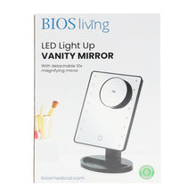 Load image into Gallery viewer, Vanity mirror in its packaging