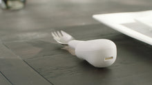 Charger l'image dans la galerie, image of the liftware steady on a table with the Spork attachment