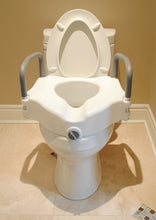 Charger l'image dans la galerie, Raised Toilet Seat with Handles attached to a toilet