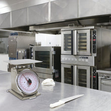 Load image into Gallery viewer, Mechanical Food Scale in a commercial kitchen