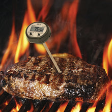 Load image into Gallery viewer, DT130 Digital Pocket Food Thermometer taking a steak temperature