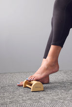 Charger l&#39;image dans la galerie, picture of a foot on a wooden foot massager
