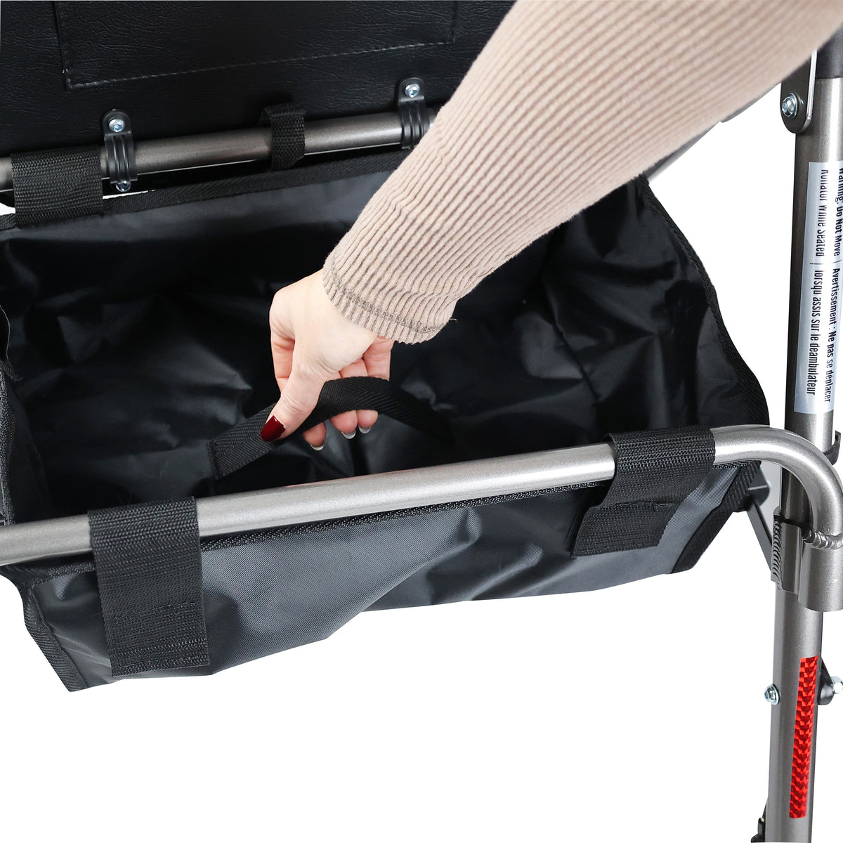 Close up of how to colapse the rollator