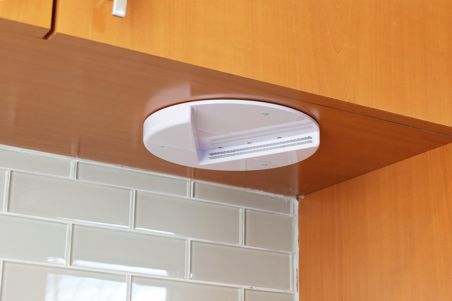 Under Cabinet Jar Opener on wall