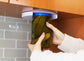 Under Cabinet Jar Opener in use