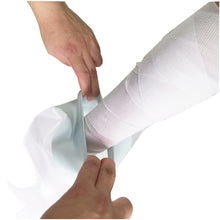 Load image into Gallery viewer, cast protector being pulled onto a persons arm
