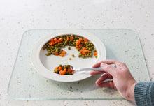 Load image into Gallery viewer, inner lip plate in use with a food being lifted by a spoon of the plate
