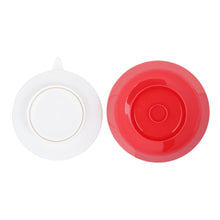 Load image into Gallery viewer, bottom view of the red scooper bowl with the white suction base detached
