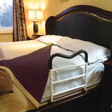 Load image into Gallery viewer, bed rail in use under the mattress at the side of the bed
