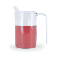large handled transparent mug with red liquid inside