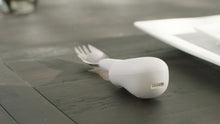 Charger l&#39;image dans la galerie, image of the liftware steady on a table with the Spork attachment
