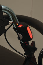 Load image into Gallery viewer, LED light on a handle of a rollator lit up in red
