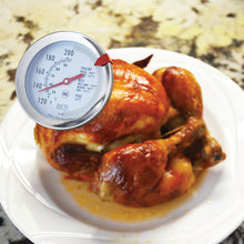 Load image into Gallery viewer, DT159 Dial Meat &amp; Poultry Thermometer checking the temperature of a cooked chicken
